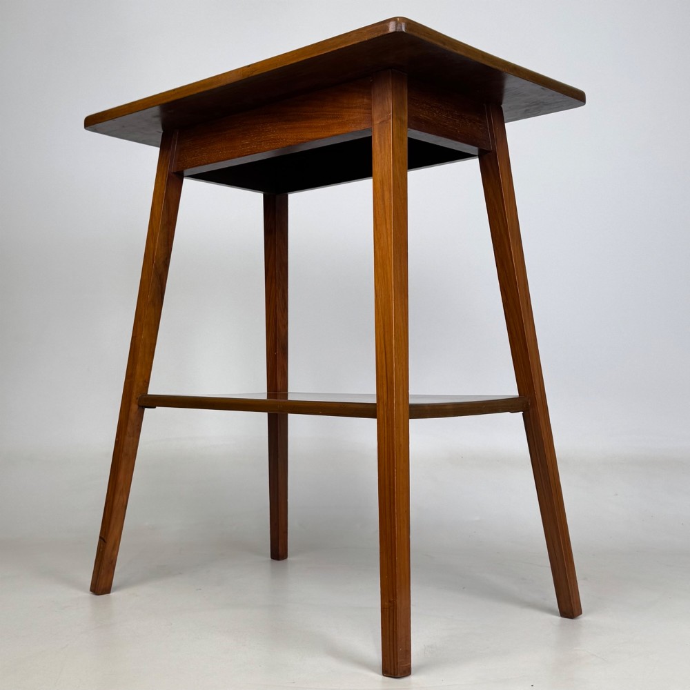 An Edwardian walnut side table featuring square apron framing, four splayed tapered legs, and an integrated lower undertier shelf. View II