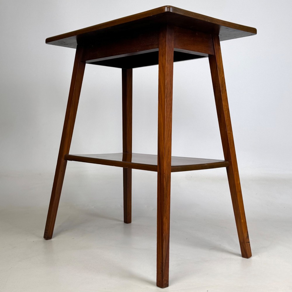 An Edwardian walnut side table featuring square apron framing, four splayed tapered legs, and an integrated lower undertier shelf. View VI