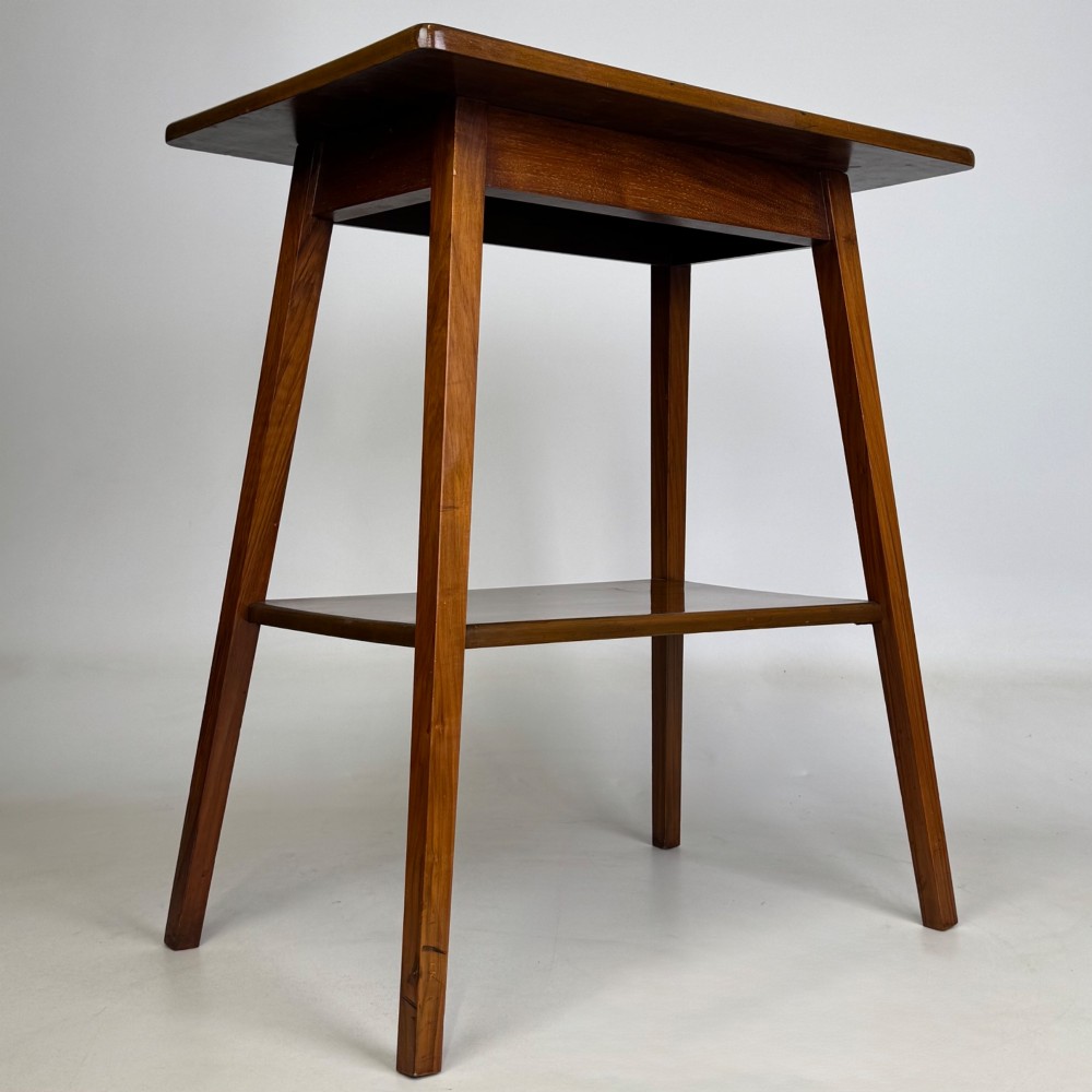 An Edwardian walnut side table featuring square apron framing, four splayed tapered legs, and an integrated lower undertier shelf. View VIII