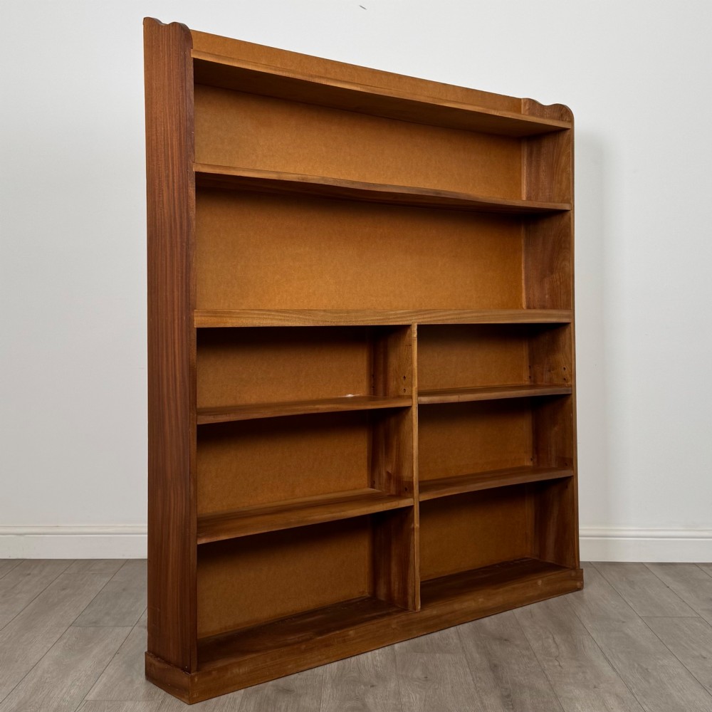 A large twentieth-century open walnut bookcase featuring multiple fixed shelves with a central divider on the lower section. View VIII
