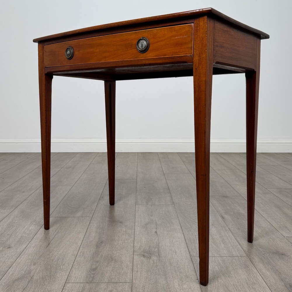 An 18th-century Georgian mahogany writing table featuring a single full-width drawer with two circular brass handles and tapered square legs. View II