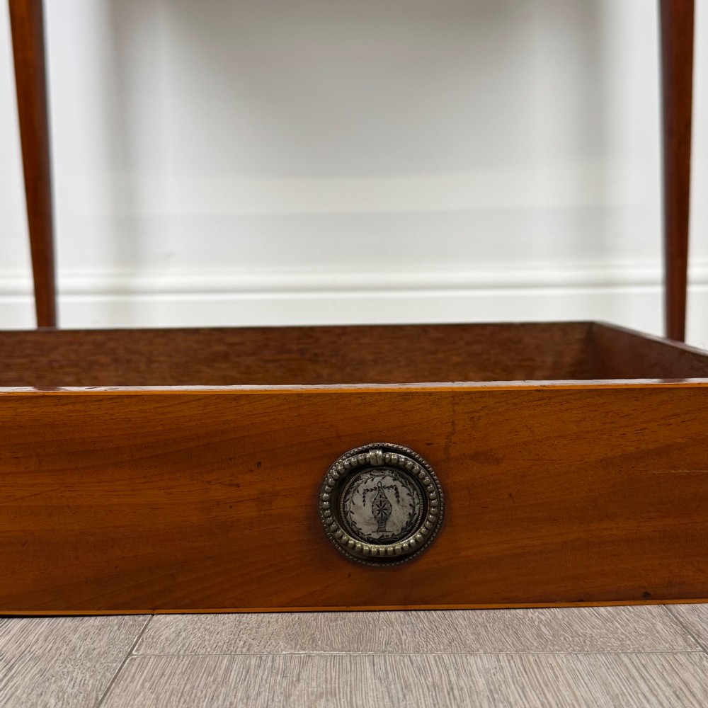 An 18th-century Georgian mahogany writing table featuring a single full-width drawer with two circular brass handles and tapered square legs. View XI