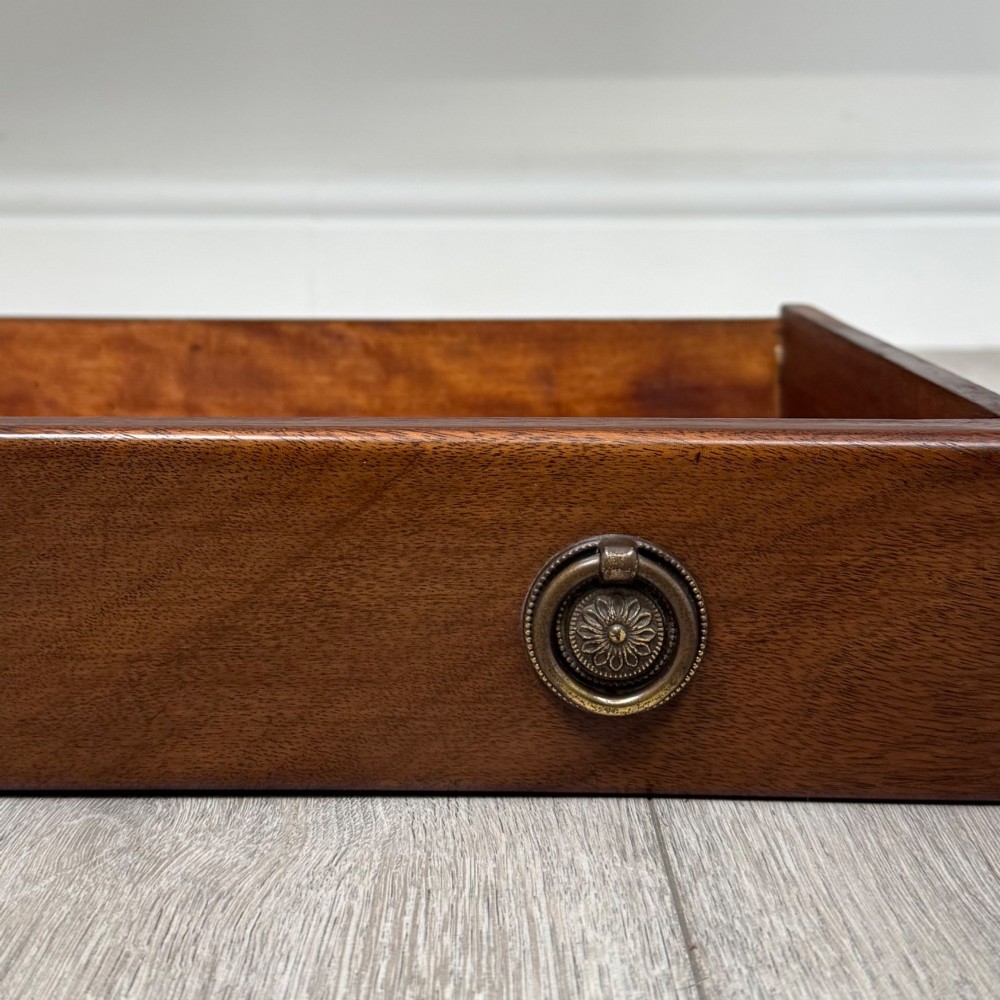A Victorian mahogany writing table featuring two frieze drawers with brass ring handles and four turned legs. View XI
