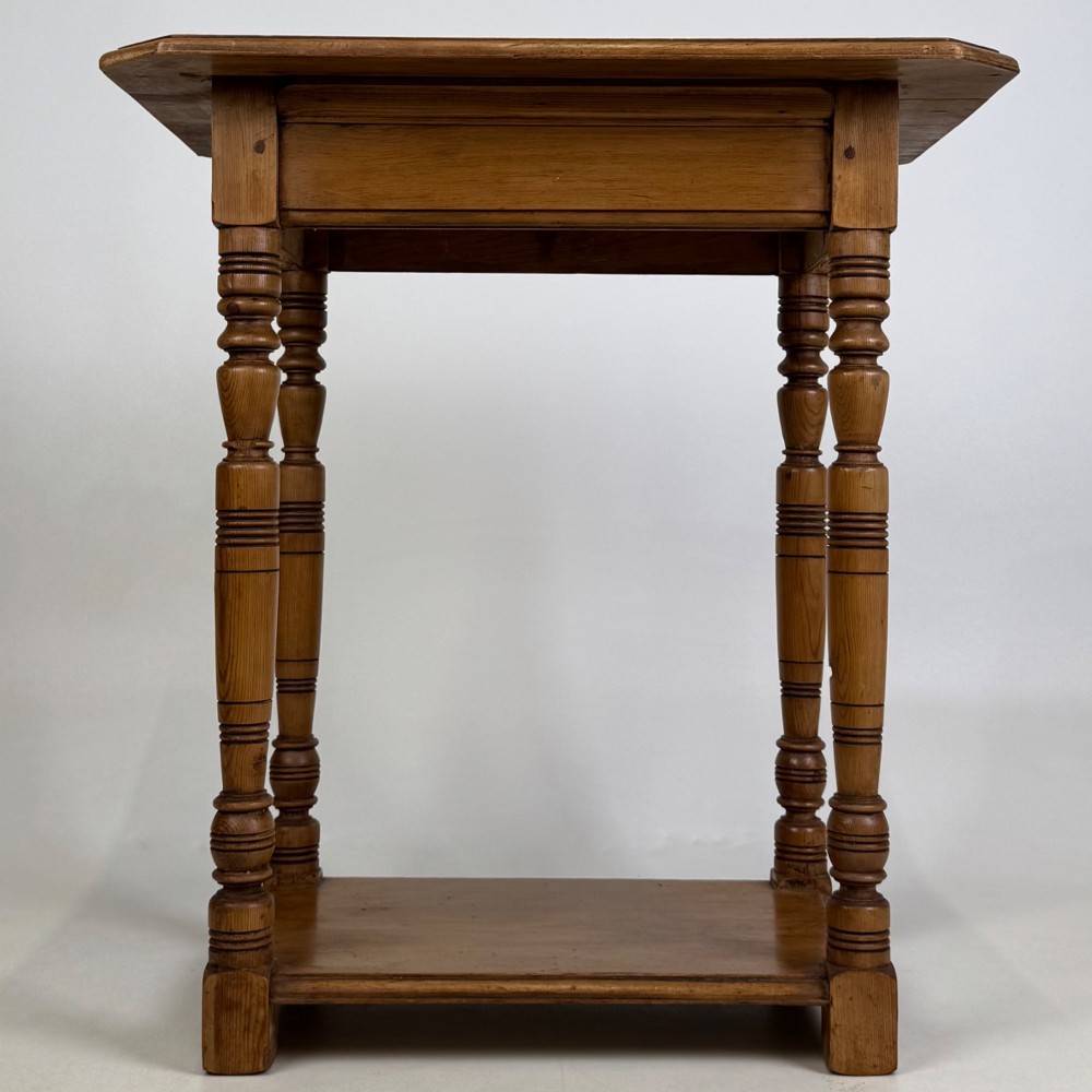 A small 19th-century Victorian oak side table featuring turned legs, a rectangular top, and a lower shelf. View V