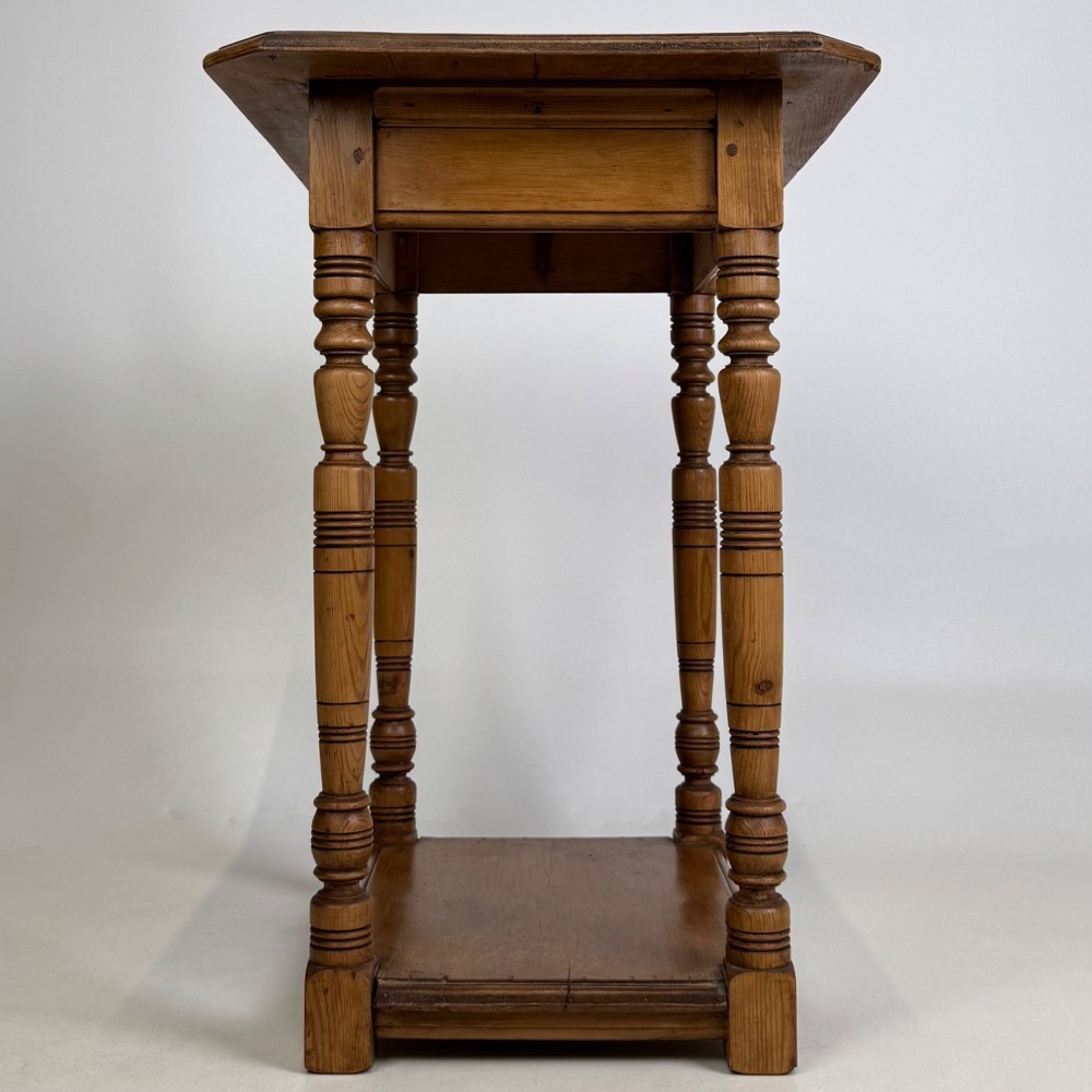 A small 19th-century Victorian oak side table featuring turned legs, a rectangular top, and a lower shelf. View VII