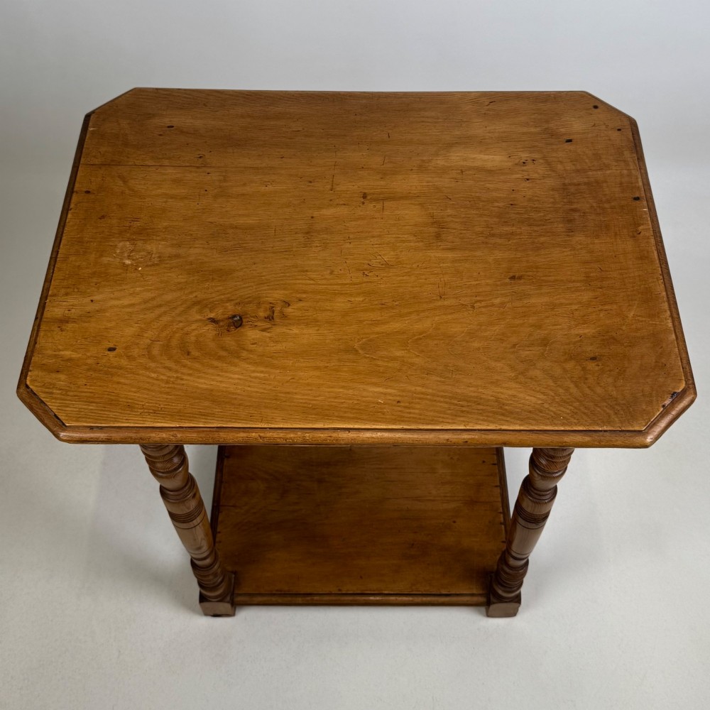 A small 19th-century Victorian oak side table featuring turned legs, a rectangular top, and a lower shelf. View IX