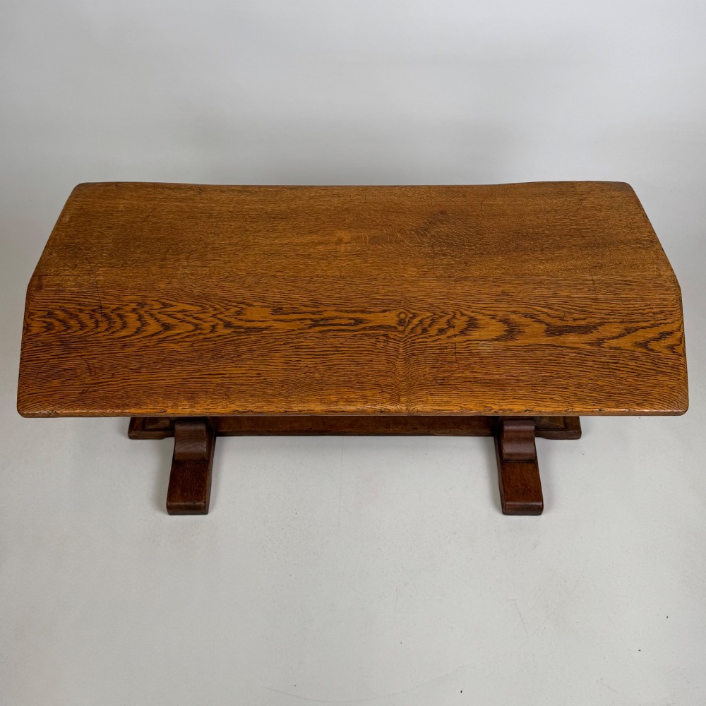 A small 20th-century solid oak coffee table featuring heavy bulbous turned baluster legs connected by a low stretcher base. View IX