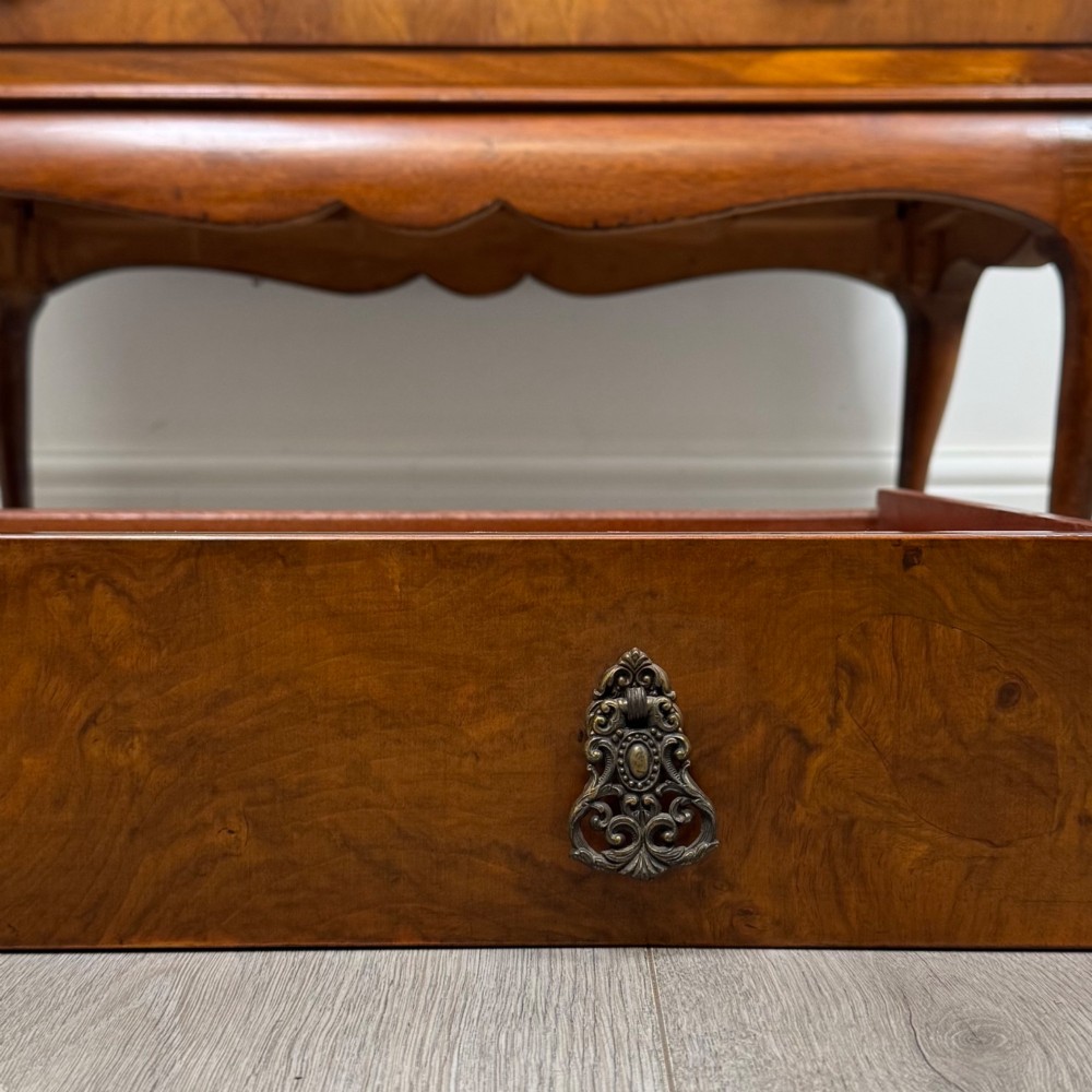 An Edwardian figured walnut writing bureau featuring a slant front above three drawers and carved cabriole legs. View XIII