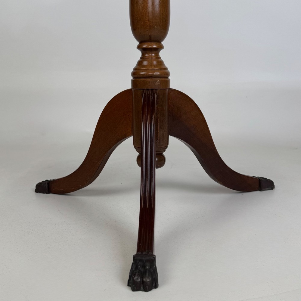 A dark brown beech side table featuring a spindle gallery rim around the circular top, a turned column support, and a tripod base with claw feet. View VIII