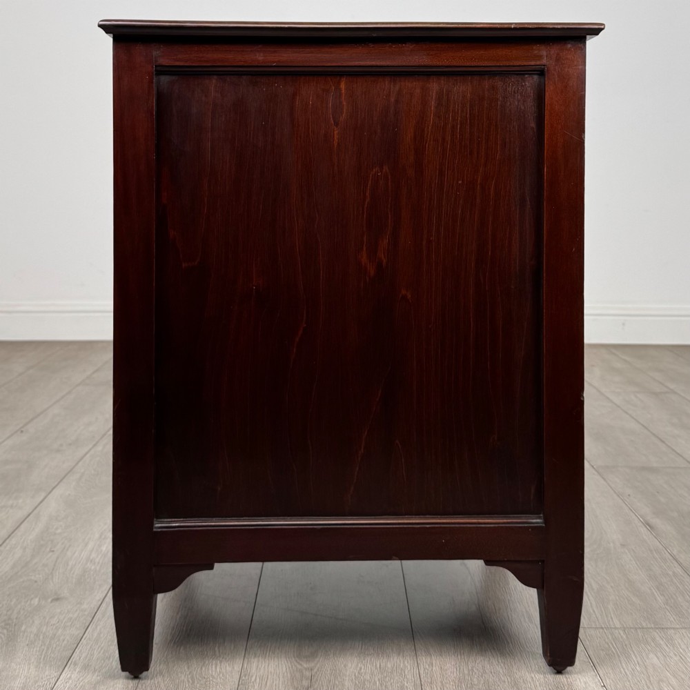 A dark stained oak Edwardian cupboard featuring a single panel door, teardrop handle, and square tapered legs. View VIII