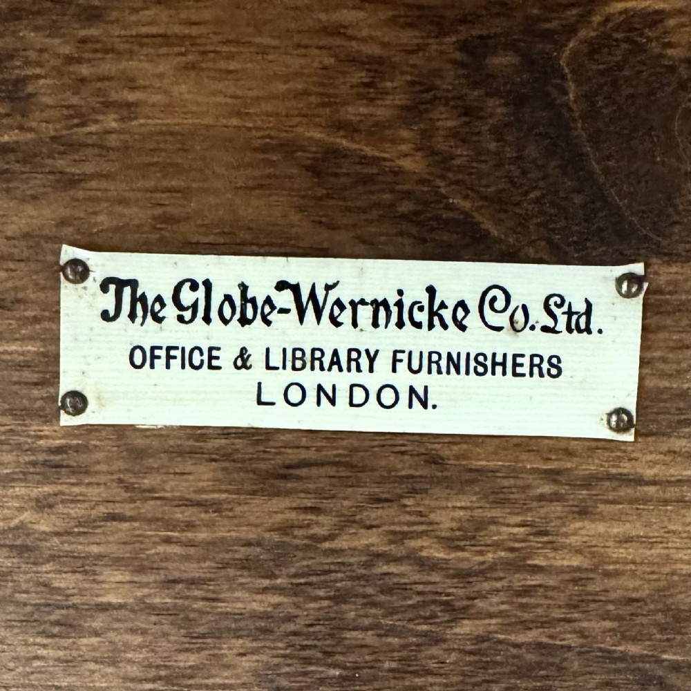 An early twentieth-century oak four-tier Globe Wernicke stacking bookcase featuring glazed lift-and-slide doors. View XII