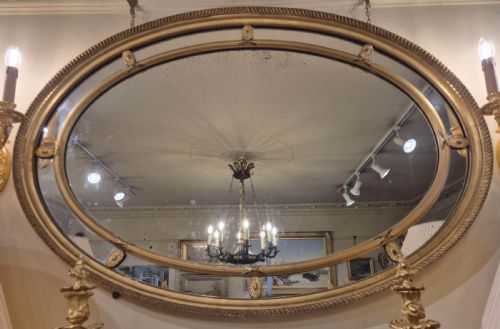 LATE 19TH CENTURY OVAL MIRROR