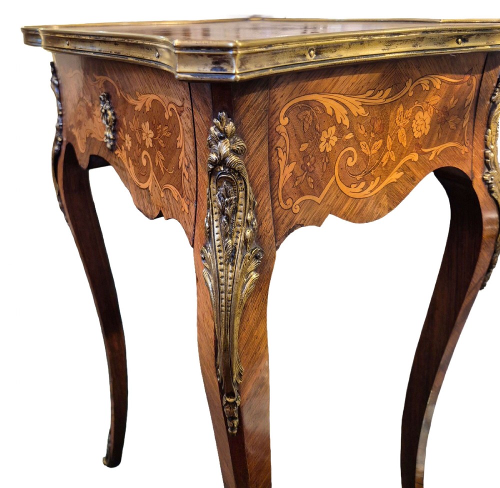 A 19th-century French Rococo Revival occasional table featuring floral marquetry wood veneers, cabriole legs, and cast ormolu mounts. View IV