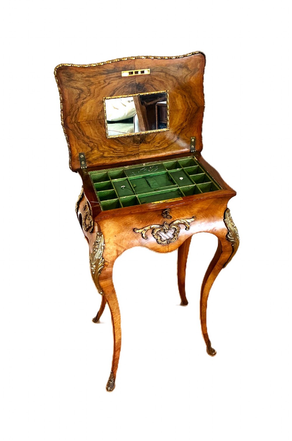 A 19th-century French walnut occasional table featuring cabriole legs, decorative gilt-bronze mounts, marquetry inlay on the top, and a moulded metal rim. View III