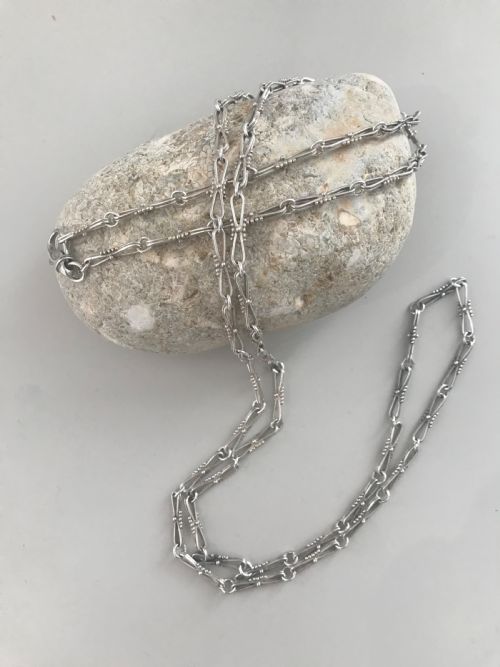 A stylish fancy link vintage long silver chain circa 1960s