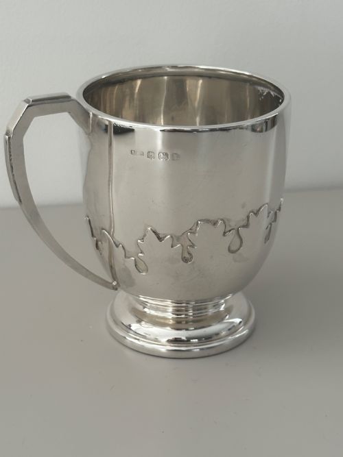 Silver christening mug hallmarked Birmingham 1935.