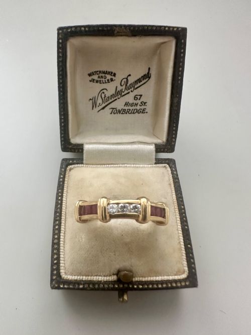A vintage 18ct diamond and ruby ring