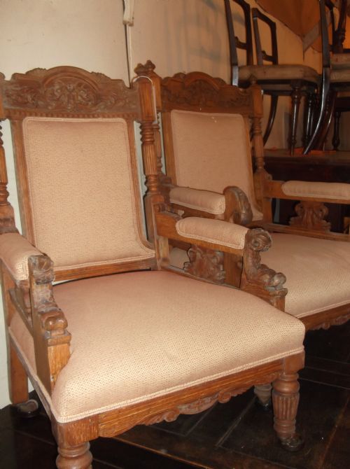 Pair of Victorian Carved Oak Dolphin Armchairs