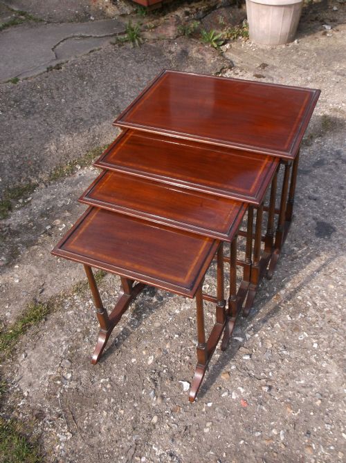 Nest of 4 Inlaid Mahogany Tables