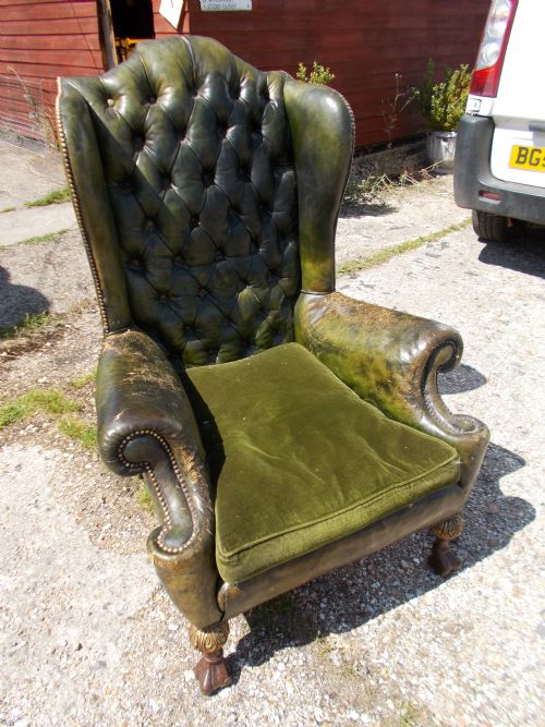 Old Leather Wing Back Upholstered Armchair