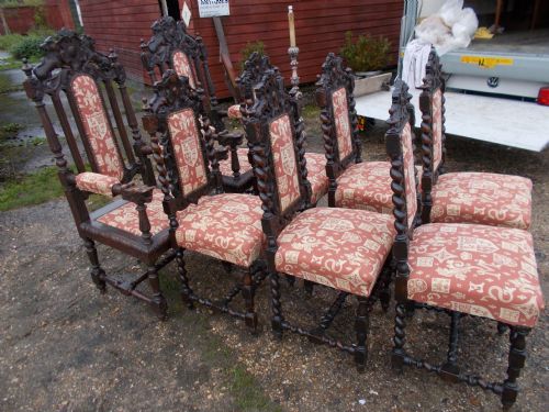 Set of 8 Carved Oak Dining Chairs