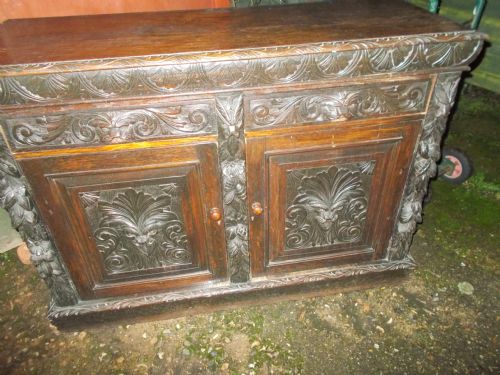 Late Victorian Carved Oak Greenman Side Cabinet