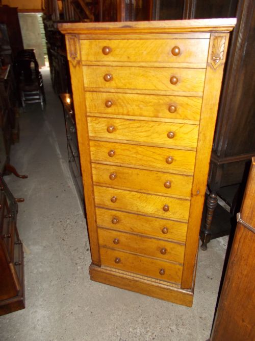 Good Tall Oak 12 Drawer Wellington Chest.