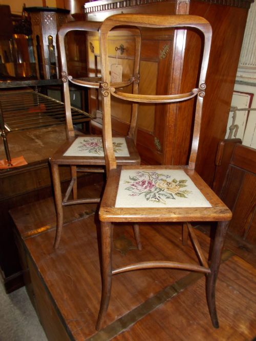 Unusual Pair of Rosewood "Correction" Chairs