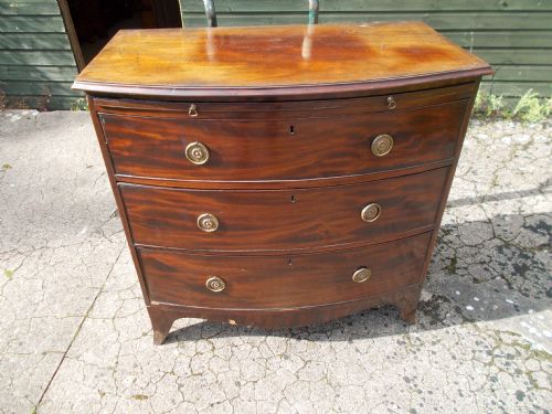 19th Century Mahogany Bow Front Chest with Slide.