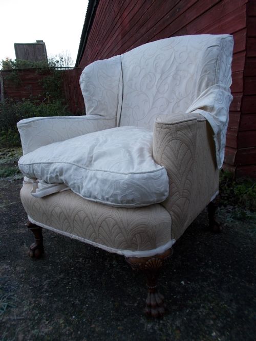 Pair of Early 20th Century Carved Walnut Wing Back Chairs