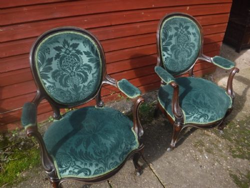 Pair of 19th Century Rosewood Armchairs with Applied Brass Work