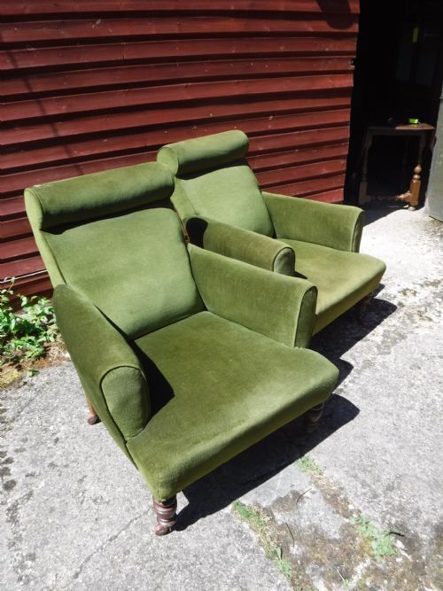 Pair of Late Victorian Roll Back Upholstered Armchairs