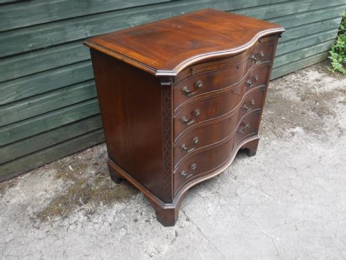 Small Early 20th Century Serpentine Front Mahogany Chest
