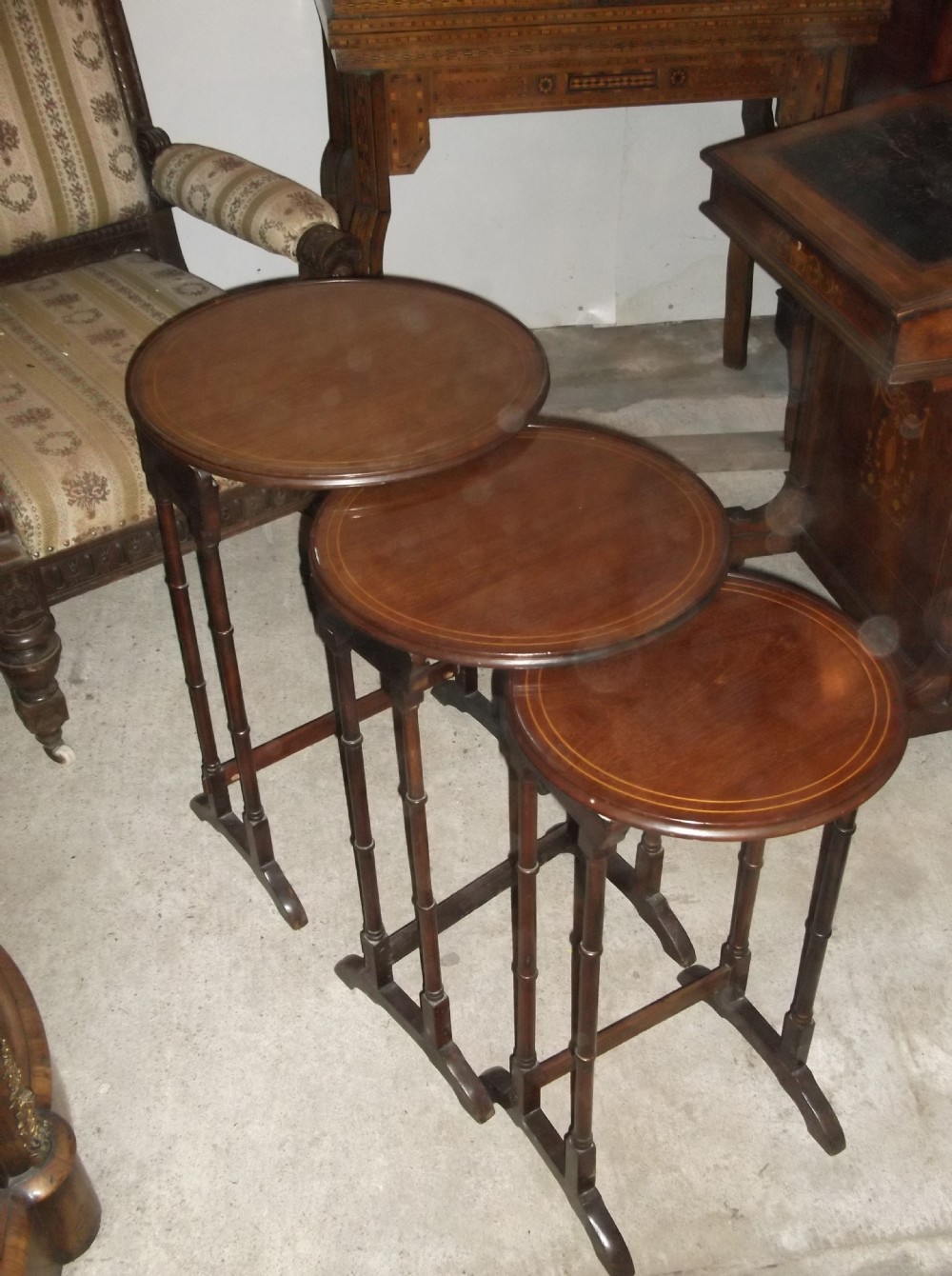 Nest of 3 Edwardian inlaid mahogany tables