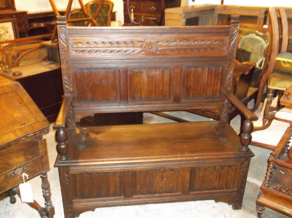 Early 20th century oak panelled hall seat