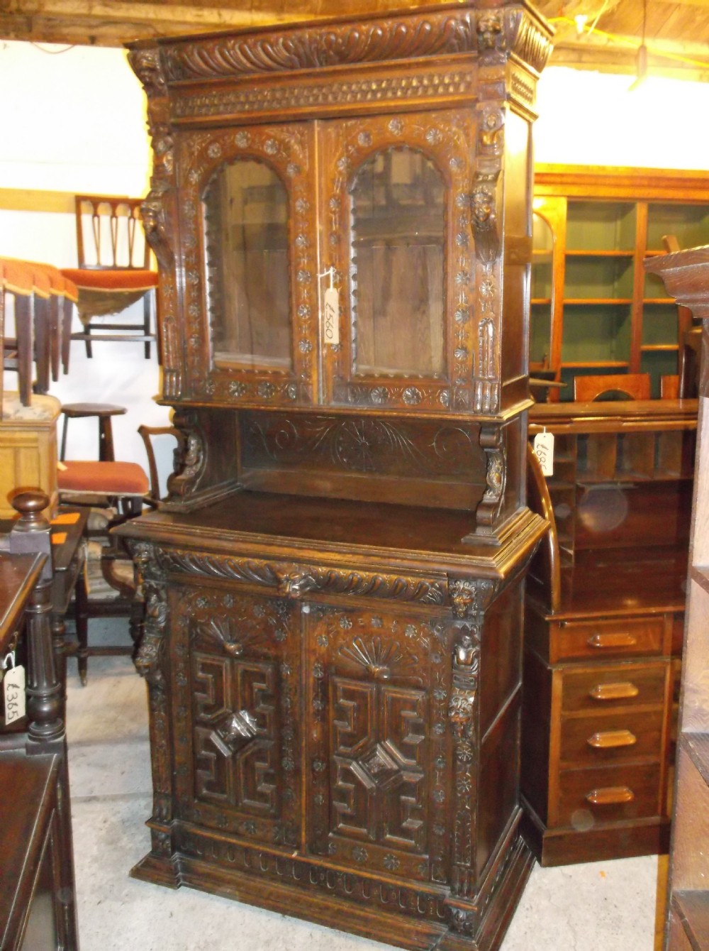 19th century carved oak bookcase cabinet