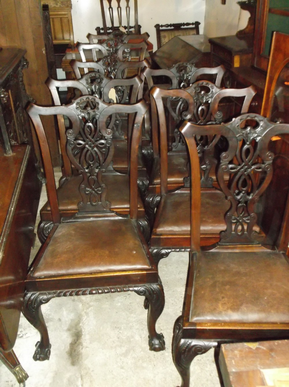 Set of 8 carved mahogany dining chairs
