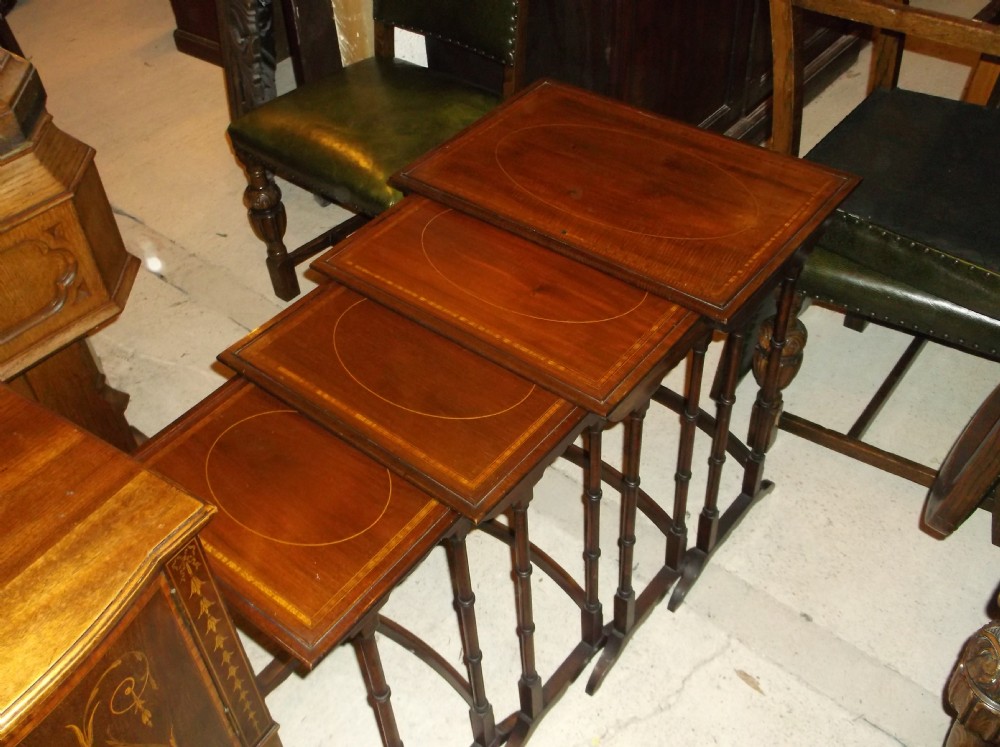 Edwardian inlaid mahogany nest of 4 tables.