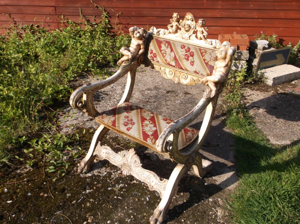 Carved decorated armchair