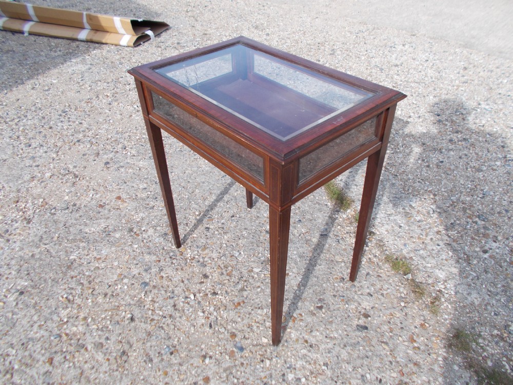 Inlaid mahogany display table