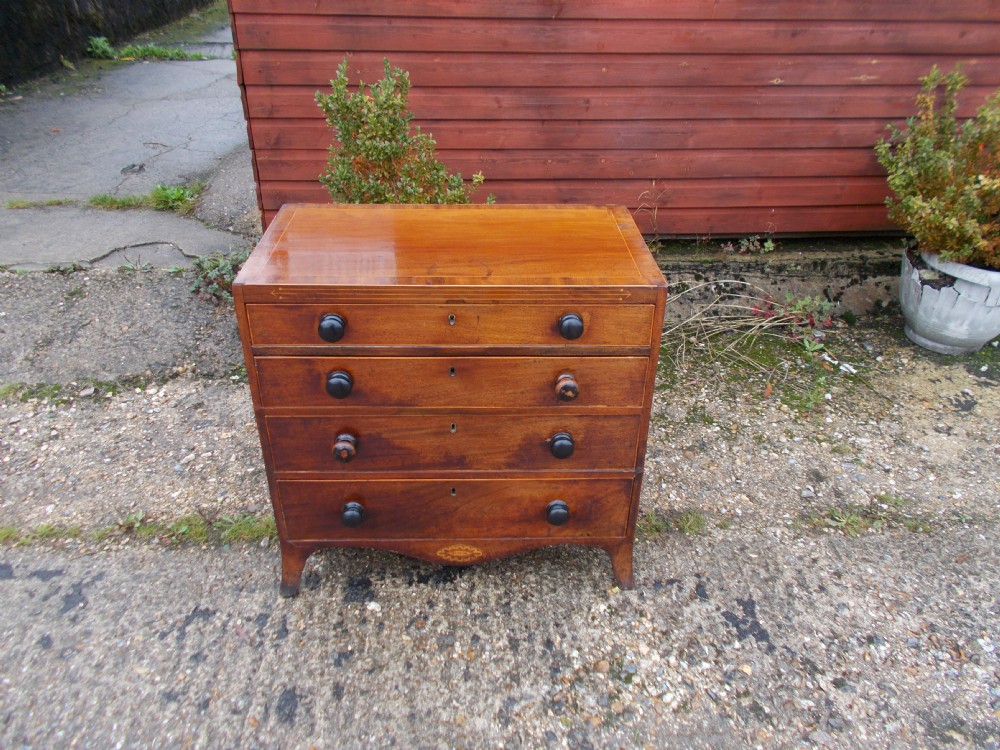 Small Early 19th century inlaid chest of drawers.