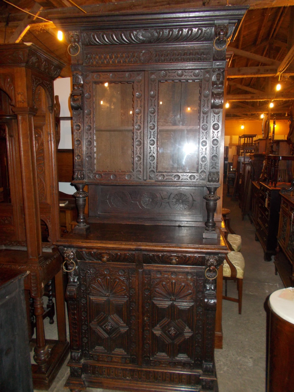 Late 19th century 2 part carved oak cabinet