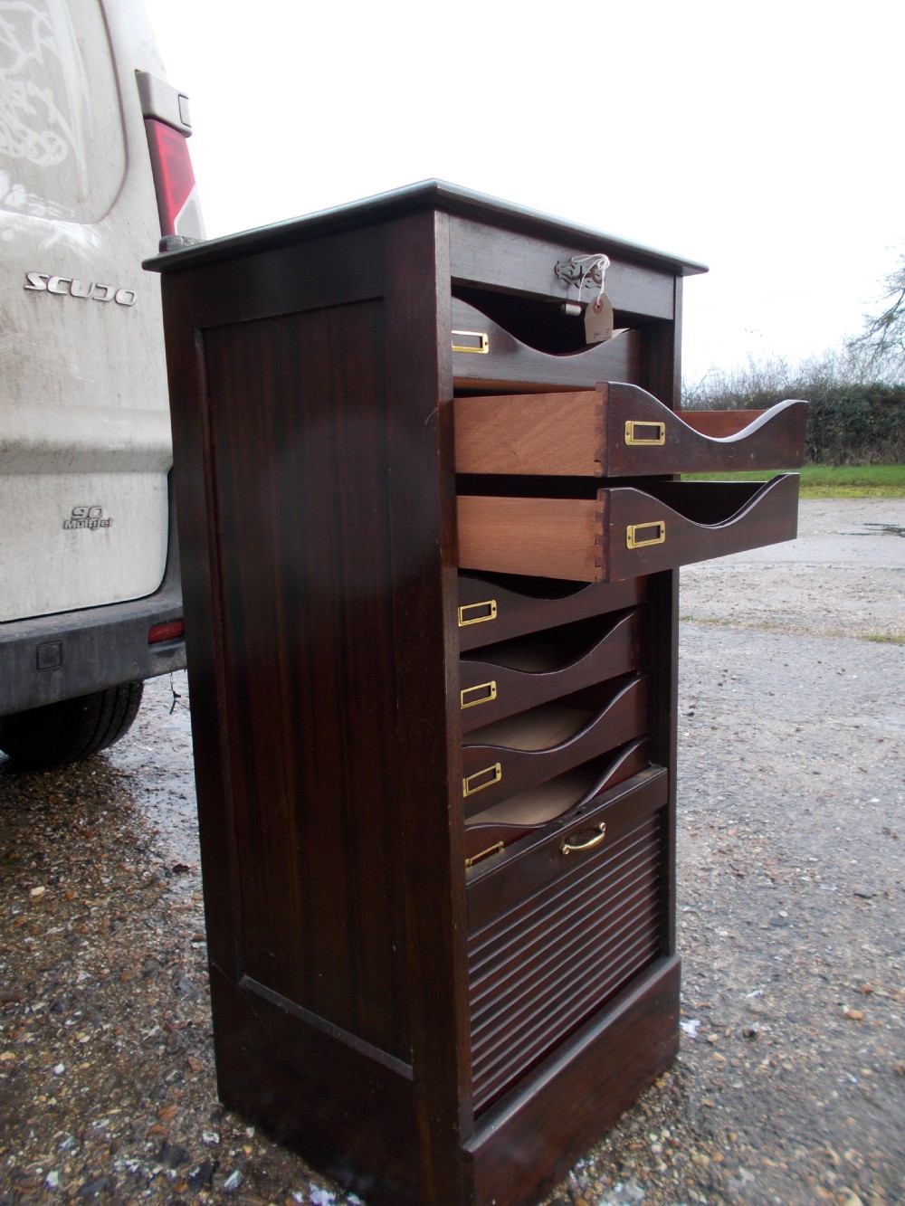 Mahogany tambour front office cabinet