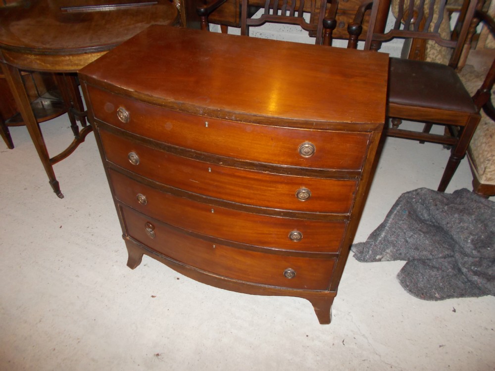 Small early 20th century bow front chest