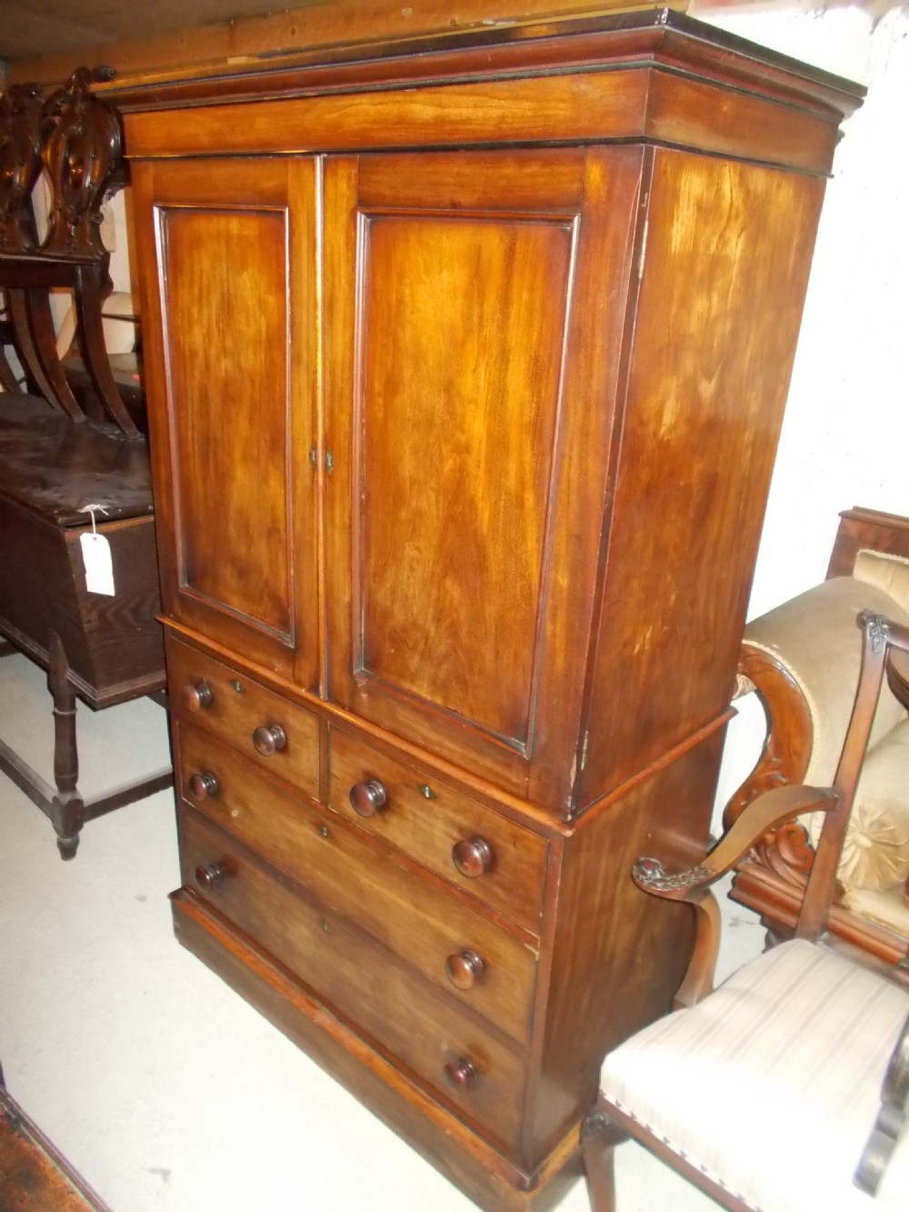 Unusual small sized 19th century linen press.
