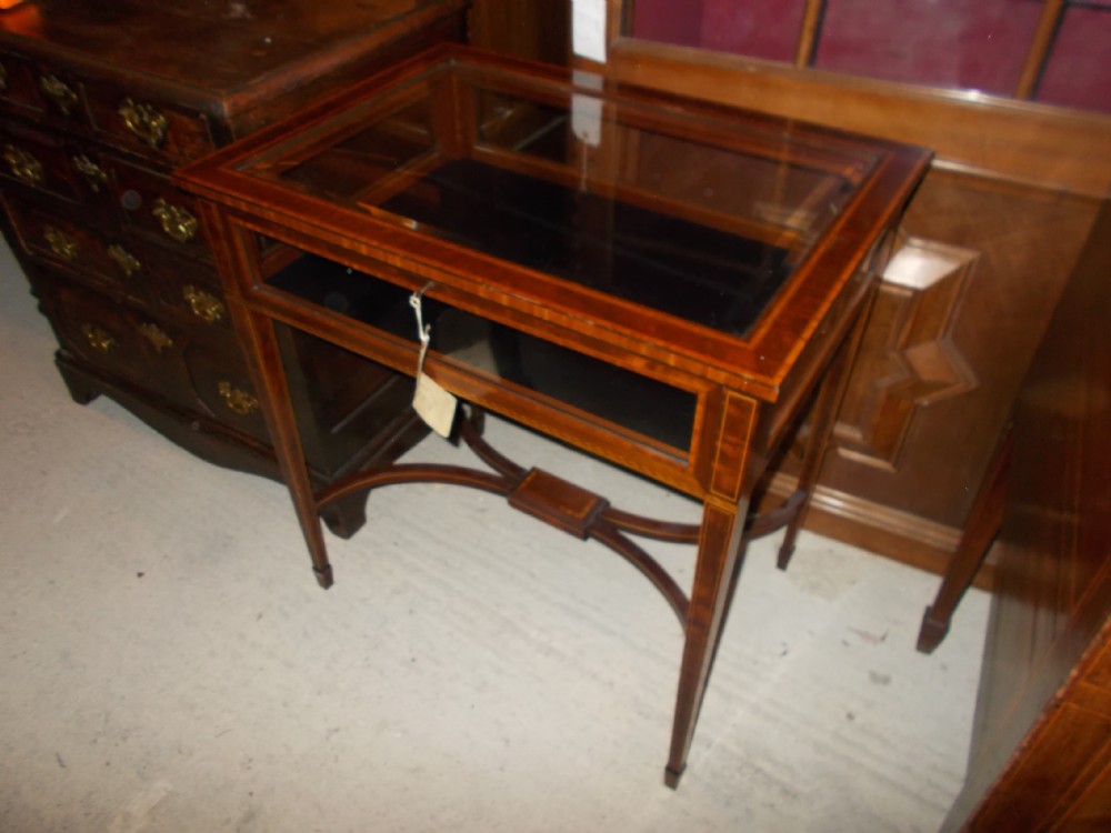 Good Edwardian inlaid mahogany display table.