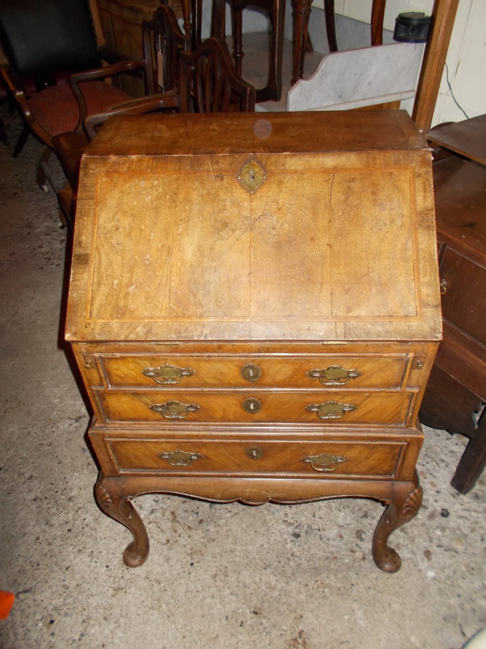 Small and good copy of an early 18th century bureau.