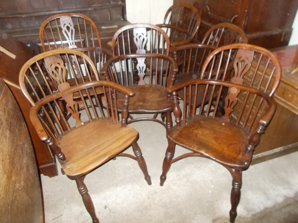 A matched set of 6 yew and elm Windsor armchairs
