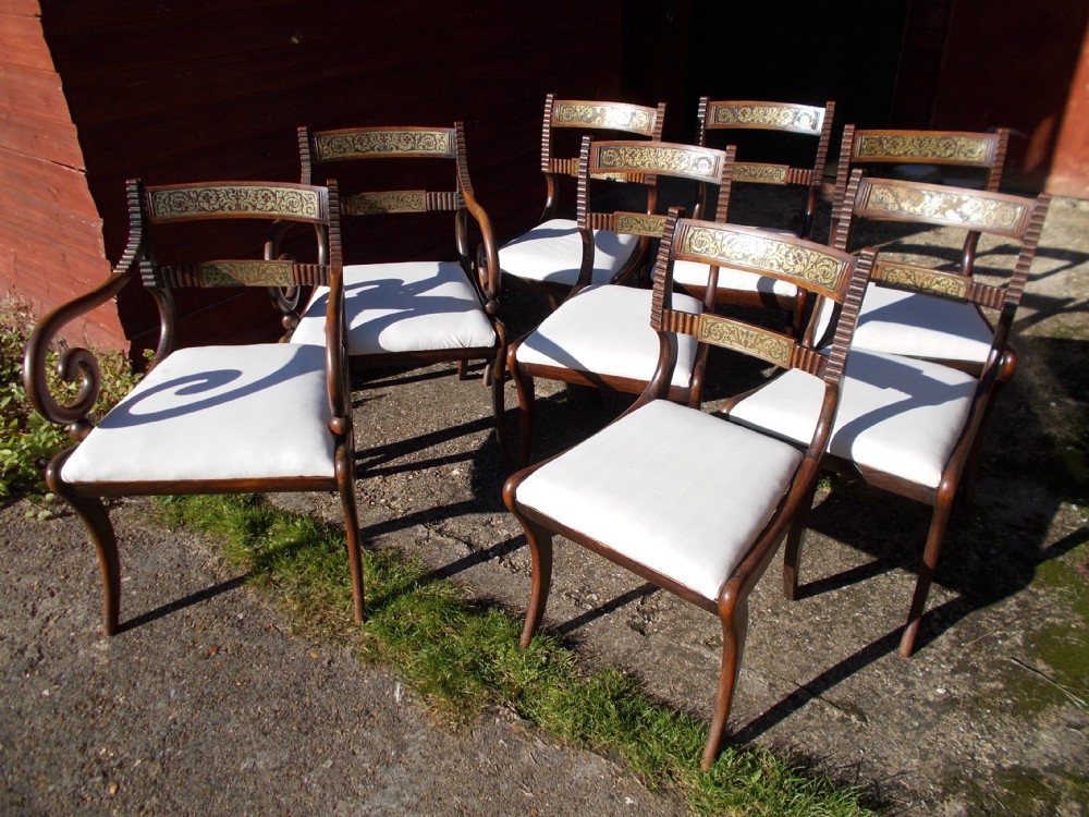 Set of 8 Regency brass inlaid dining chairs