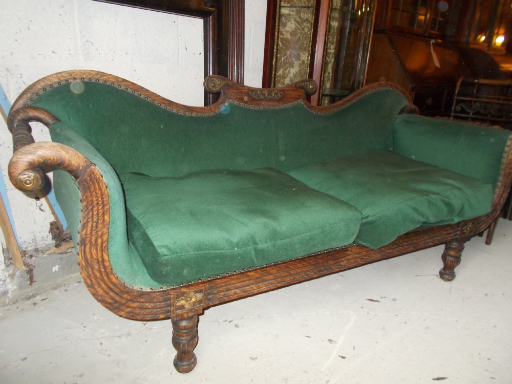 Good Regency simulated rosewood gilt metal mounted sofa.